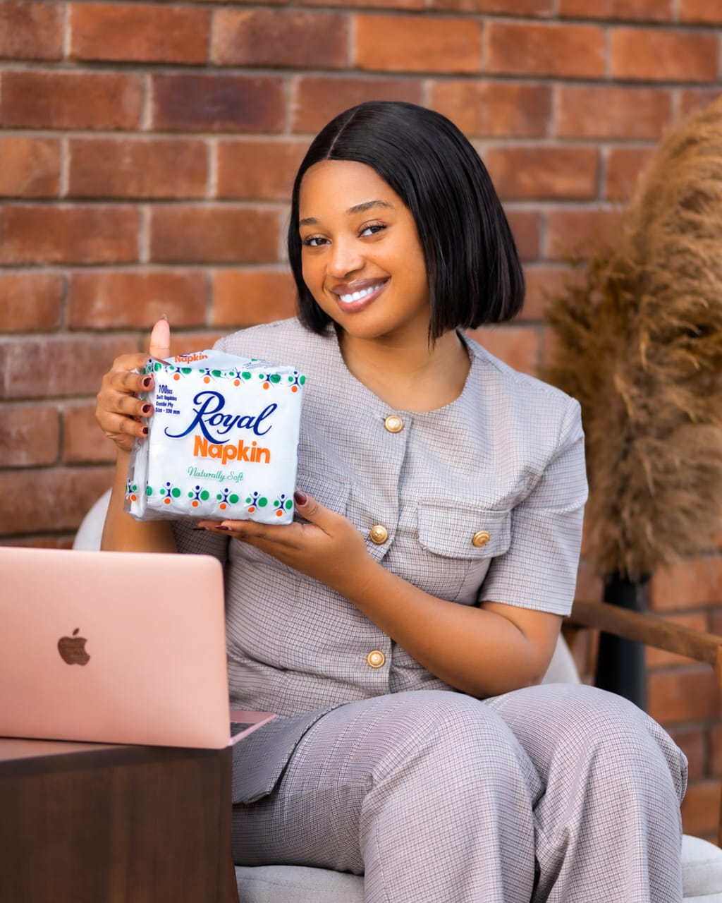 Woman presenting Royal Napkin